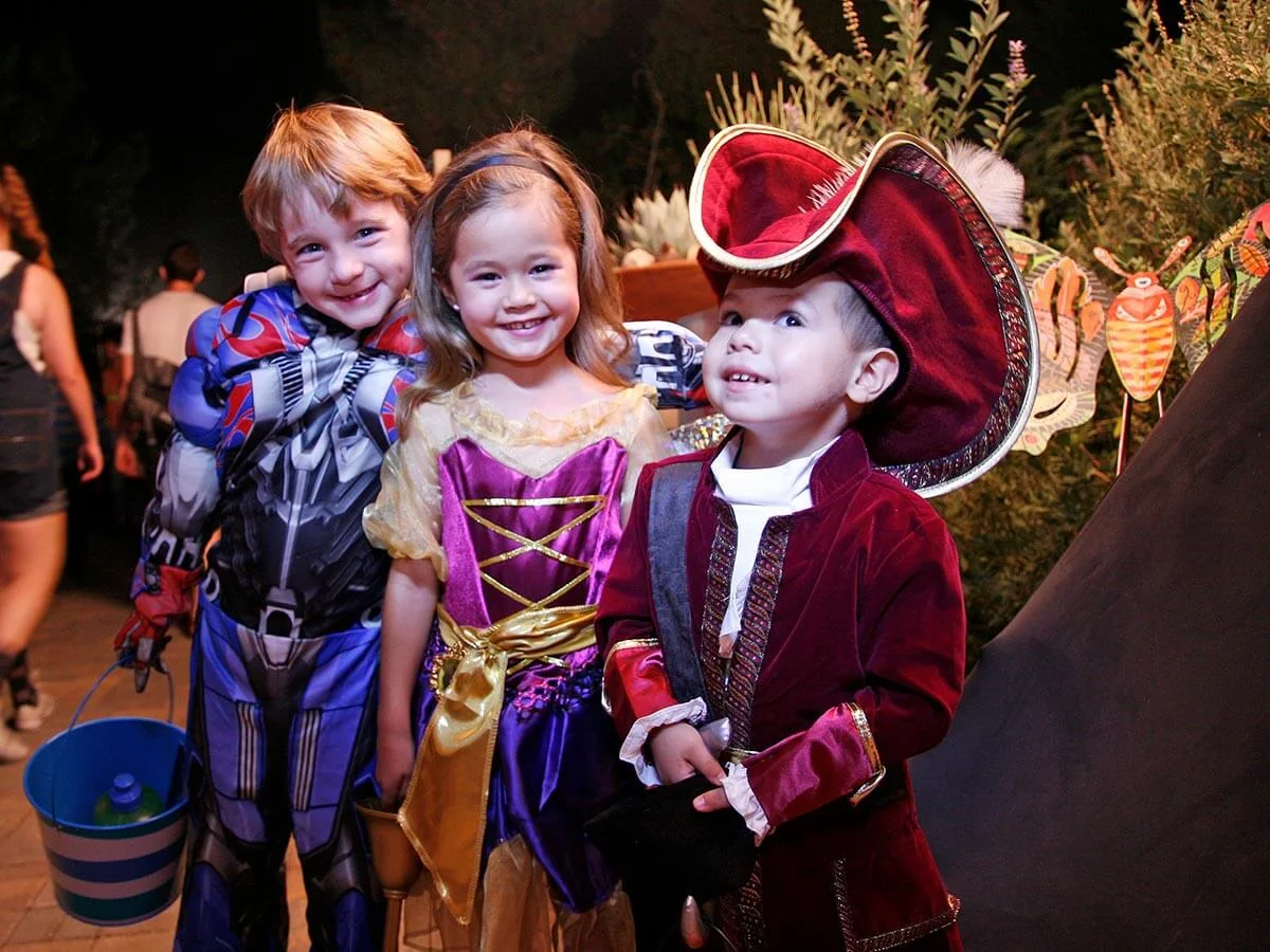 Children in colorful Halloween costumes at Springs Preserve’s Haunted Harvest.