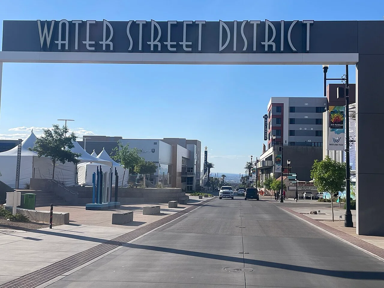 Water Street District entrance arch spanning a street in downtown Henderson.