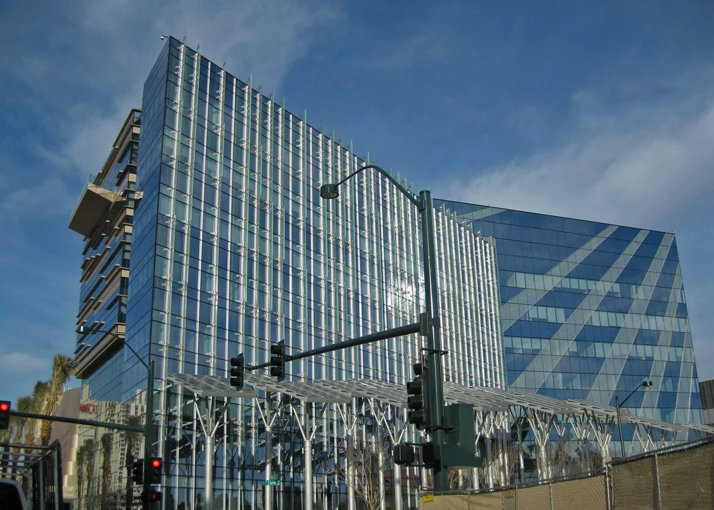 Las Vegas City Hall exterior with glass walls and solar structures.